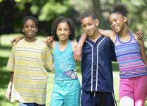 4 teens walking